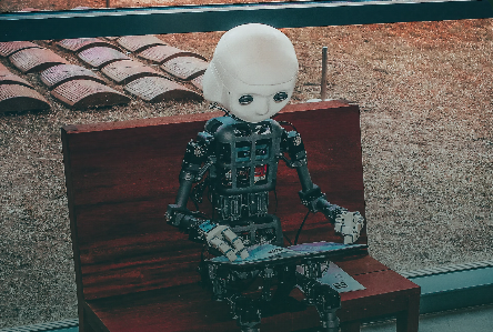 AI robot sitting on a bench